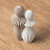 Elegante Paarstatue aus mattem PLA Filament in Beige und Weiss auf Holztisch
