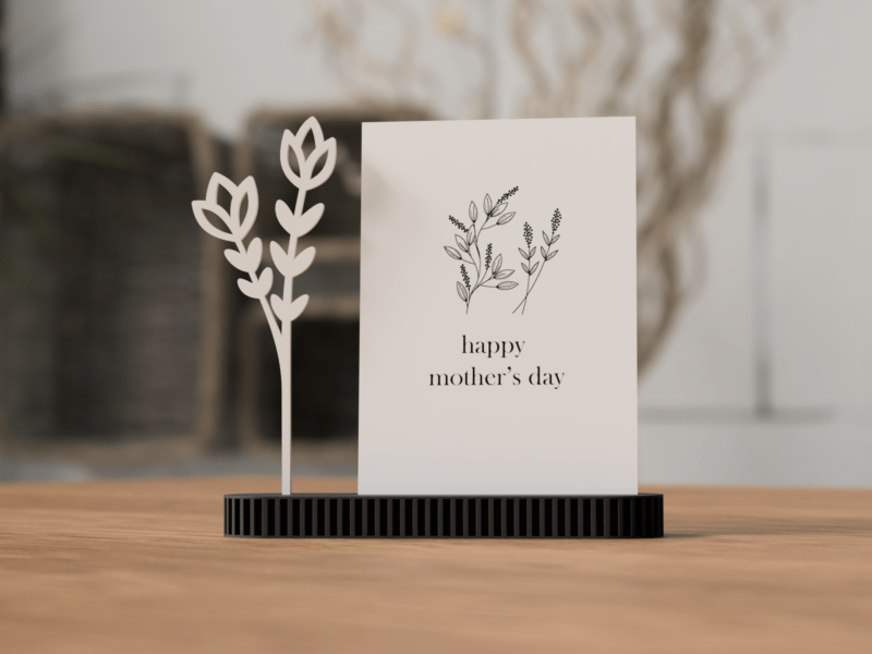 Kartenhalter für Fotos in Schwarz mit zartem Blumenmotiv und Postkarte