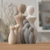 Abstrakte Familienstatue mit Katze und Hund als persönliches Familiengeschenk